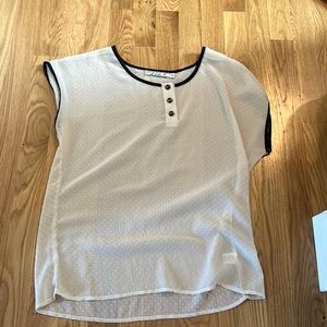 The brand is chlsek.  it is a size small